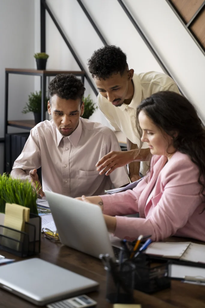 side-view-people-working-with-laptop